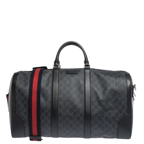 gucci carry on duffle bag.